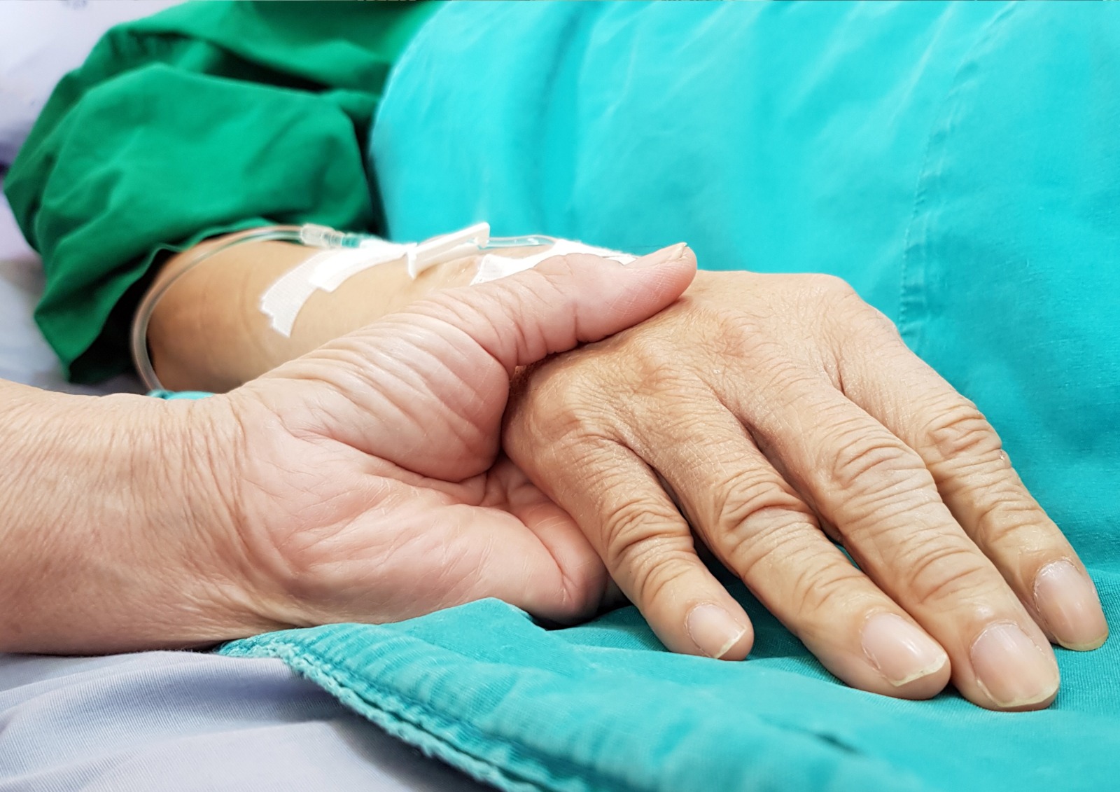 Doctor talking to an elderly patient.